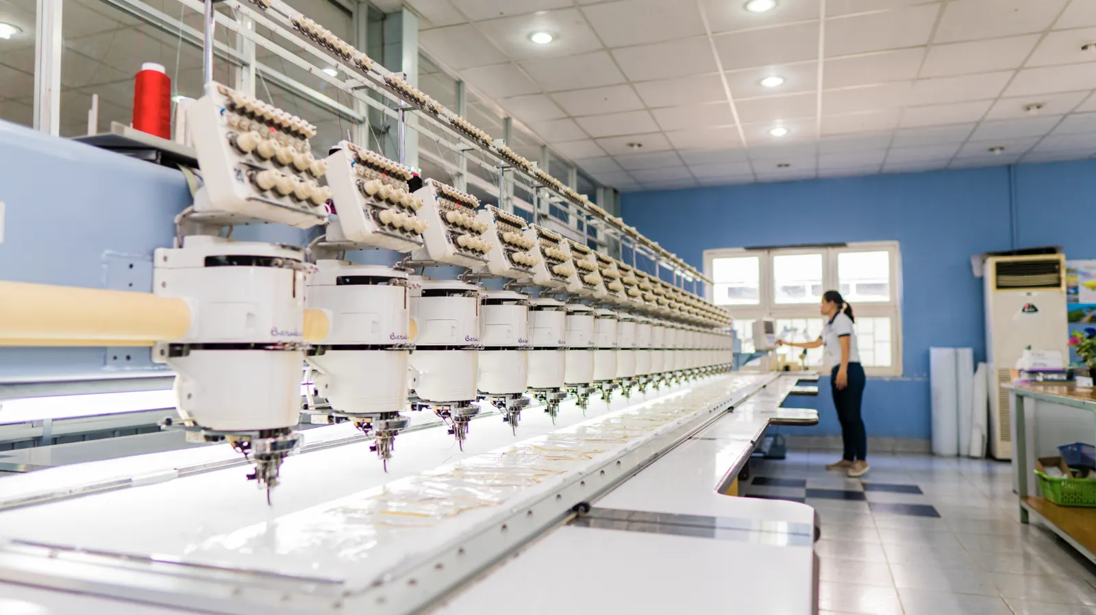 Automated embroidery process in footwear manufacturing